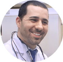 Portrait of a smiling male dentist in professional attire
