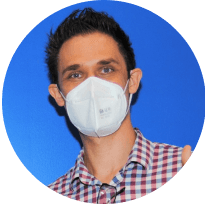 Portrait of a male orthodontist wearing a protective mask