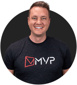 Headshot of Reece wearing a MVP Mailhouse t-shirt, smiling