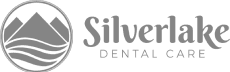 Logo of Silverlake Dental Care with a stylized lake and mountain silhouette