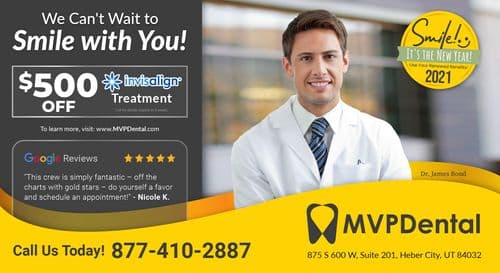 MVP Dental promotional postcard for Invisalign treatment. Features a smiling male dentist, Dr. James Bond, in a professional setting with a backdrop of a modern dental office. The left side offers a $500 discount on Invisalign treatment, highlighted in a large yellow circle. The right side of the postcard emphasizes the New Year theme for 2021, encouraging patients to use their renewed benefits. The bottom section includes the dental office's contact information and website.