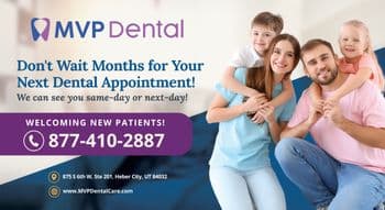 This promotional postcard for MVP Dental features a happy, smiling family of four — a father, mother, son, and daughter — embracing in a close, affectionate group hug. The family is casually dressed, suggesting comfort and approachability. The card highlights MVP Dental's prompt service with the text Don't Wait Months for Your Next Dental Appointment! We can see you same-day or next-day! prominently displayed. The clinic welcomes new patients and emphasizes its ability to accommodate immediate appointments. The logo of MVP Dental, contact number 877-410-2887, and the website www.MVPDentalCare.com are also included, with a background that blends a soothing blue into a subtle purple at the base of the card.